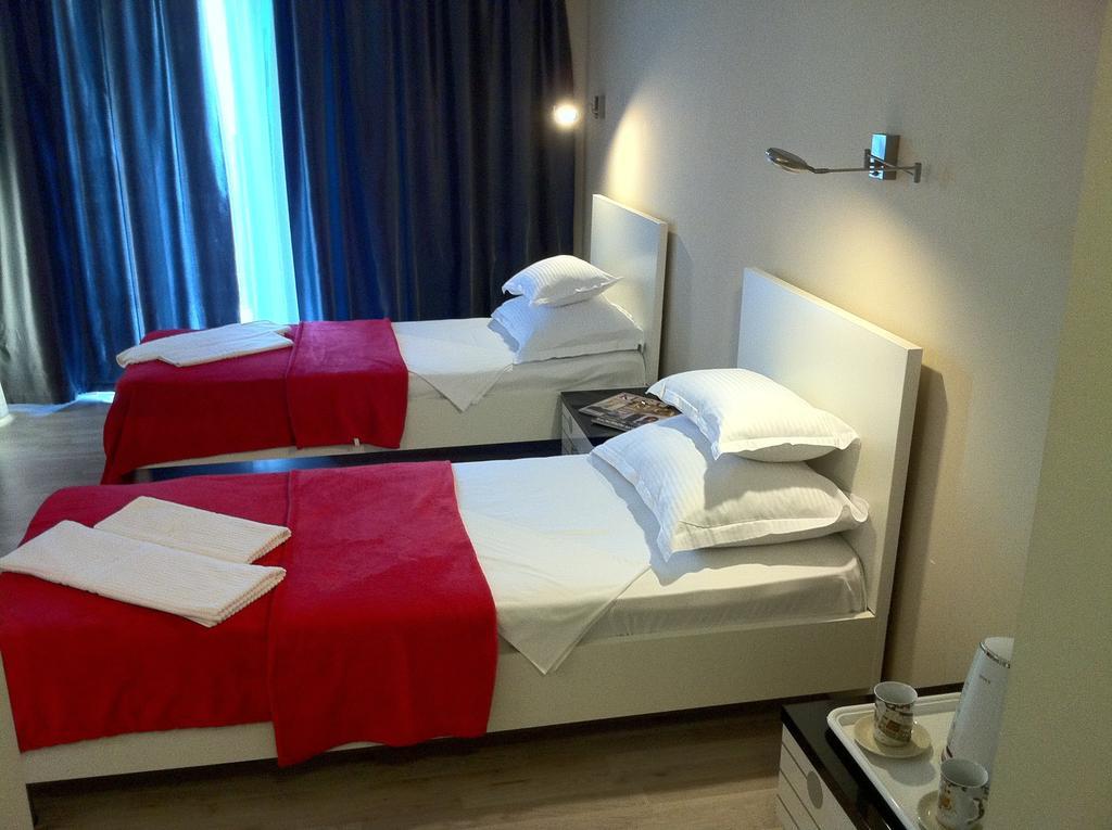 Apartments And Rooms Grand Palazzo Budva Quarto foto