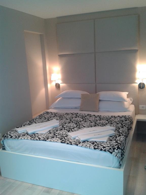 Apartments And Rooms Grand Palazzo Budva Quarto foto